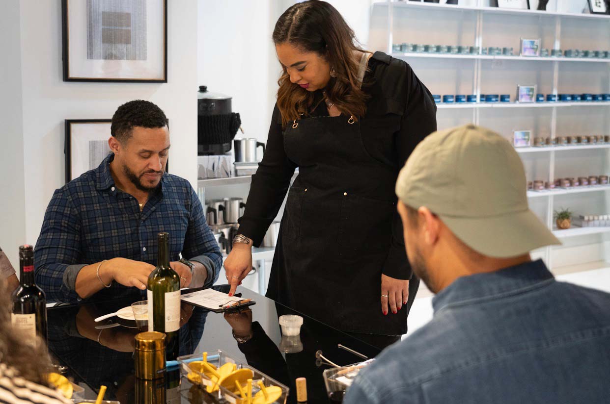 Leah interacting with customers.