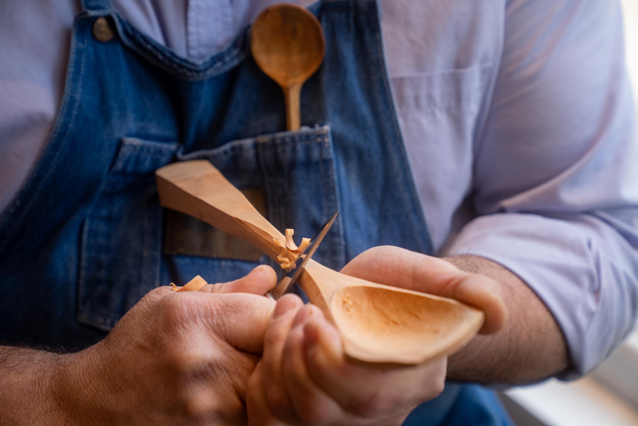 Pendola making a spoon.