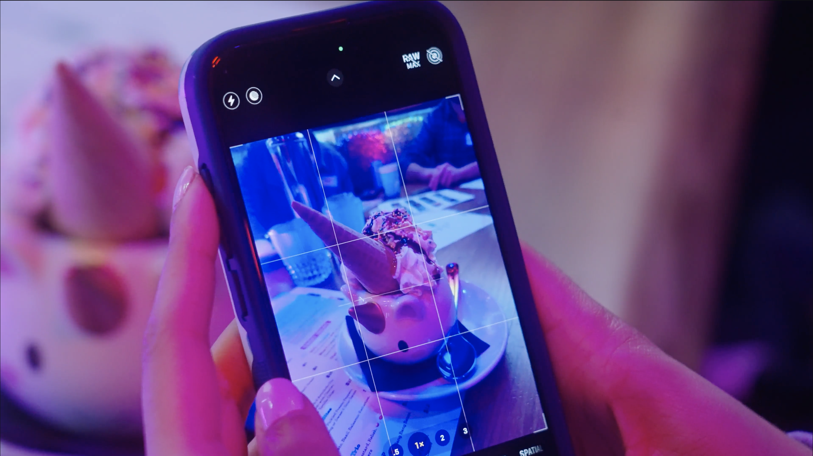customer taking photos of a dessert